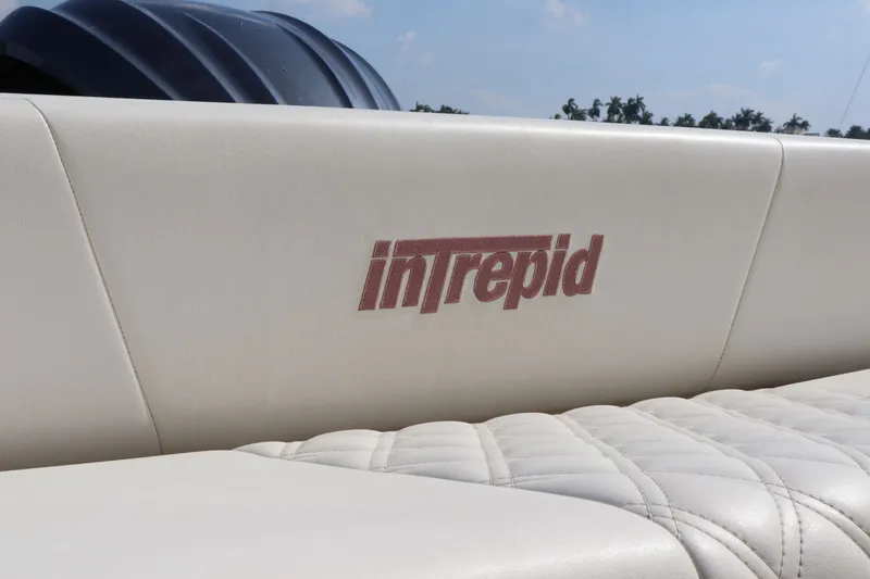 Slide: The Image of Intrepid 289 Open 2002 boat upholstery with logo. - 30