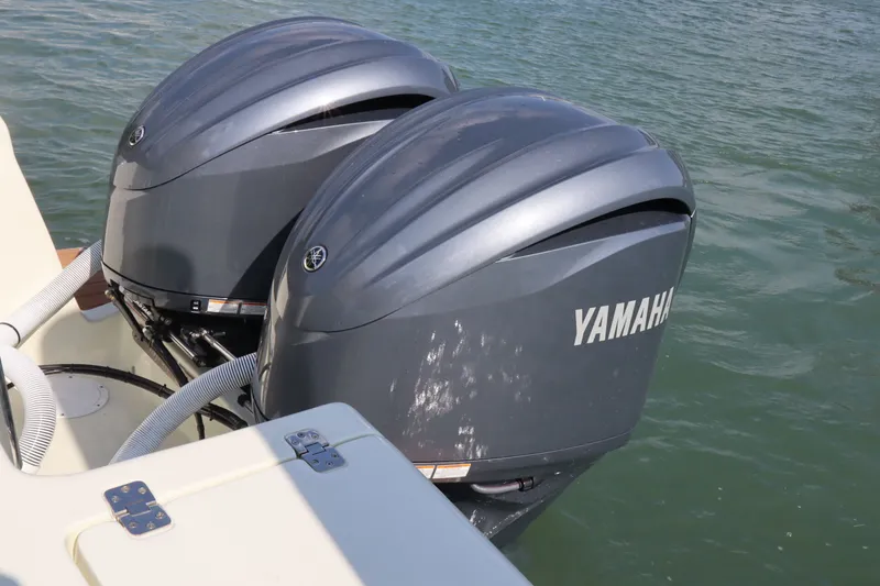 Slide: The Image of Two Yamaha outboard motors on an Intrepid 289 Open boat. - 32