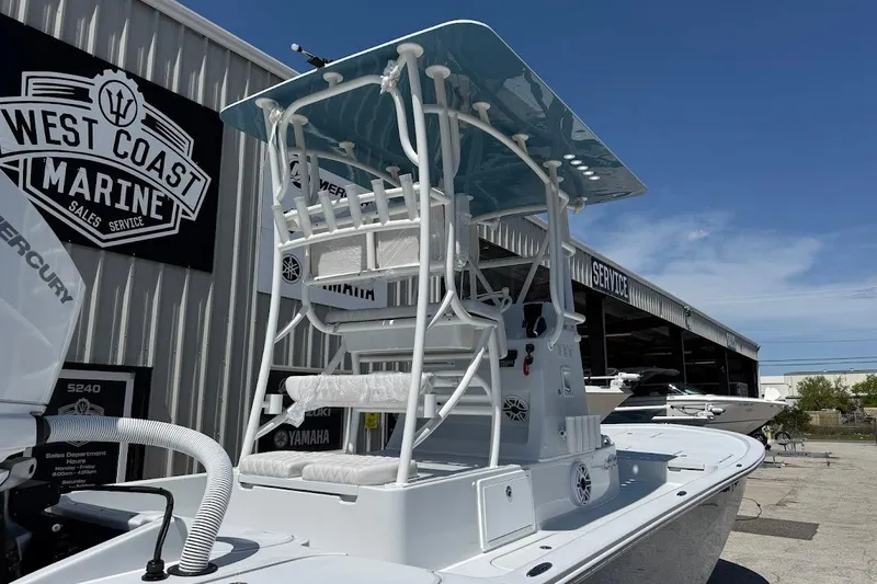 Slide: The Image of 2026 Shallow Sport 25 X3 boat at West Coast Marine dealership. - 12