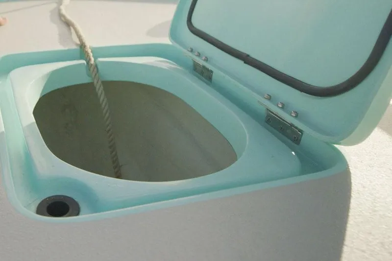 Slide: The Image of Manufacturer Provided Image: Open hatch on 2025 Shallow Sport 25 X3 boat with rope inside. - 9