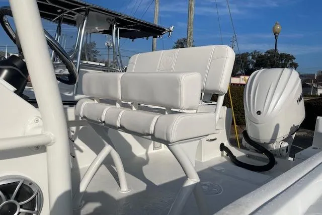 Slide: The Image of Parker 230 Coastal Elite 2026 with white seating and motor. - 6