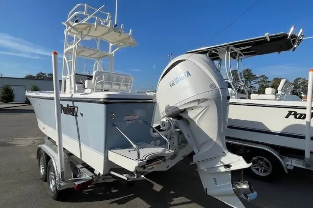 Slide: The Image of Parker 230 Coastal Elite 2026 with Yamaha engine on trailer. - 8