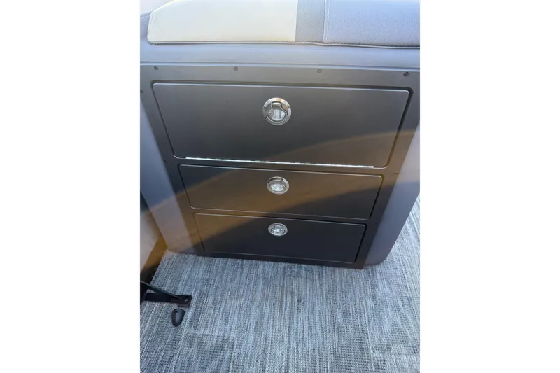 Slide: The Image of Three black drawers with chrome handles in a Viaggio x22u, 2026 model. - 11