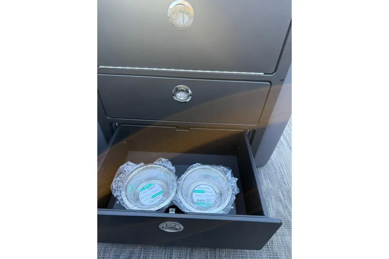 Slide: The Image of Drawer of Viaggio x22u 2026 with packaged items inside. - 12