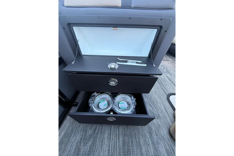 Slide: The Image of Viaggio x22u 2026 model interior storage compartments with open drawers and visible contents. - 14