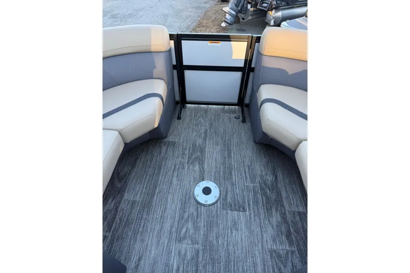 Slide: The Image of Interior of 2026 Viaggio x22u boat with gray flooring and cushioned seating. - 27
