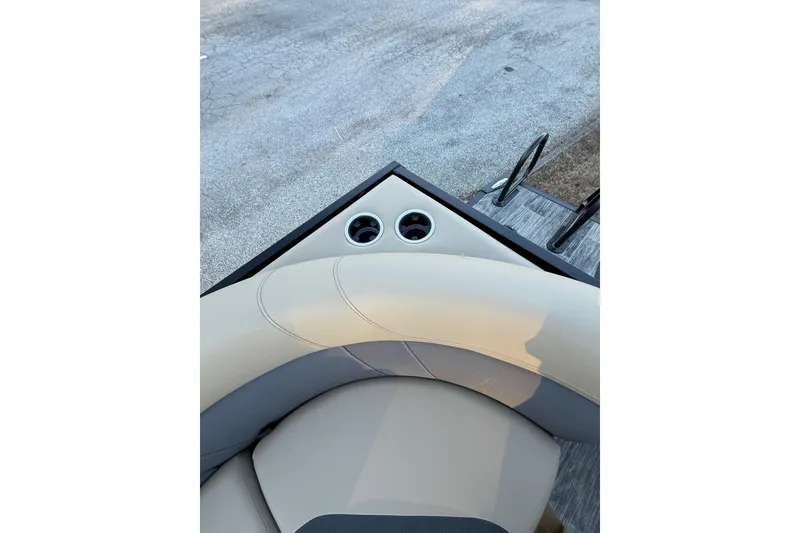 Slide: The Image of Viaggio x22u 2026 boat interior with beige seating and cup holders. - 29