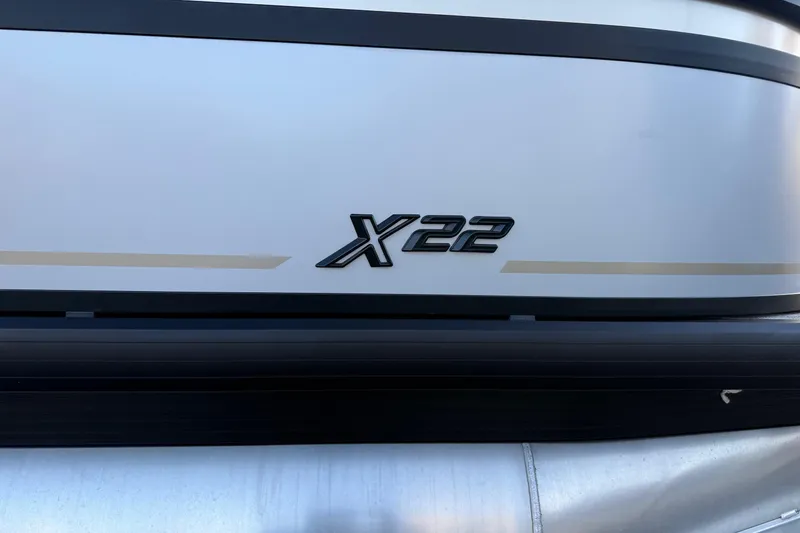 Slide: The Image of Viaggio x22u 2026 model emblem on sleek metallic surface. - 3