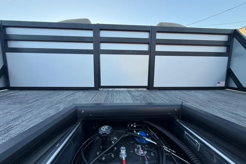 Slide: The Image of 2026 Viaggio x22u boat deck with storage compartment and wiring visible. - 34