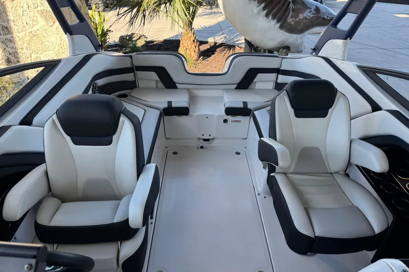 Slide: The Image of 2016 Yamaha Boats 242 Limited S E-Series interior with sleek seating and modern design. - 6
