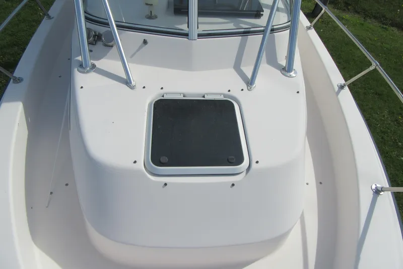 Slide: The Image of 1996 Grady-White Voyager 248 boat deck with hatch and railing. - 12