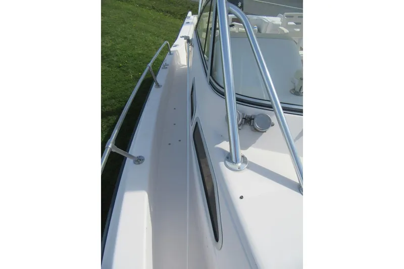Slide: The Image of 1996 Grady-White Voyager 248 boat deck with stainless steel railings. - 13