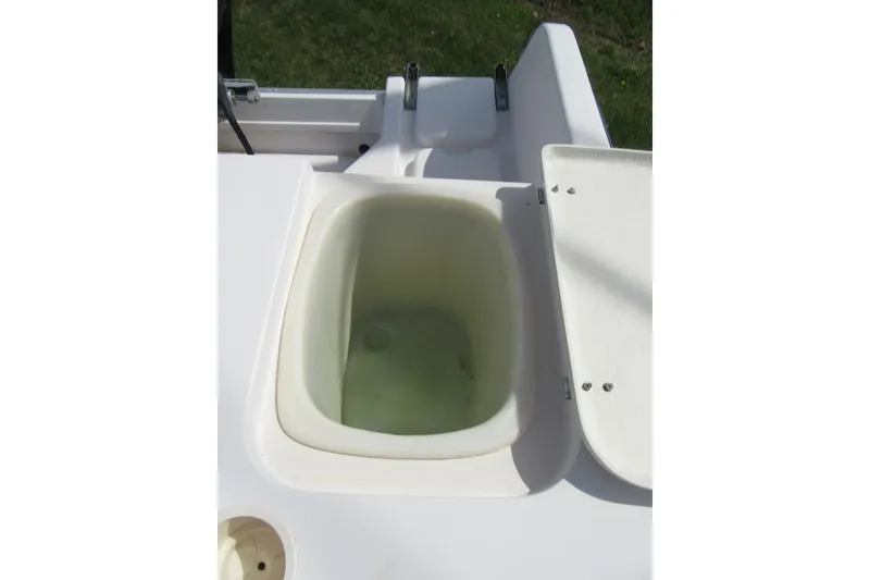 Slide: The Image of Livewell compartment on a 1996 Grady-White Voyager 248 boat, open lid view. - 43