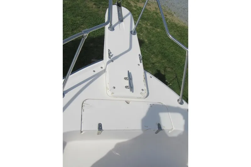 Slide: The Image of Bow of 1996 Grady-White Voyager 248 boat with stainless steel railings. - 8