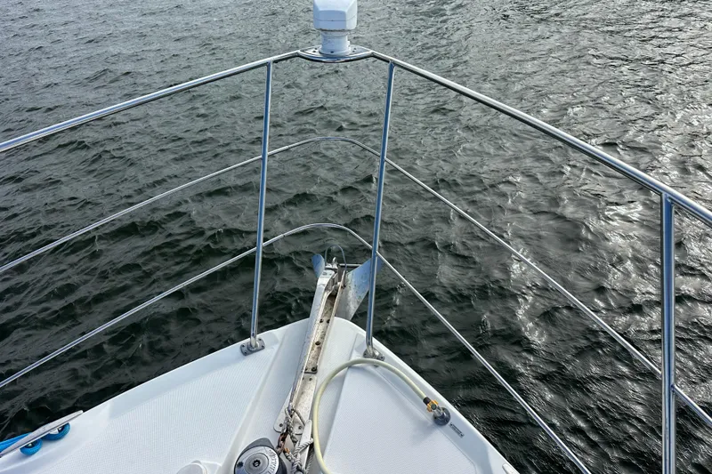 Slide: The Image of Bow of 2005 Carver 36 Super Sport yacht on open water. - 15