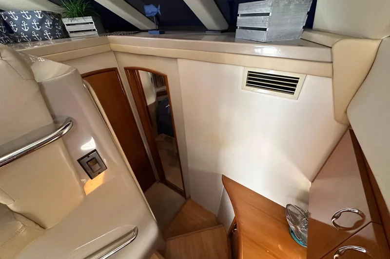 Slide: The Image of Interior of 2005 Carver 36 Super Sport yacht with wooden cabinetry and modern design. - 37