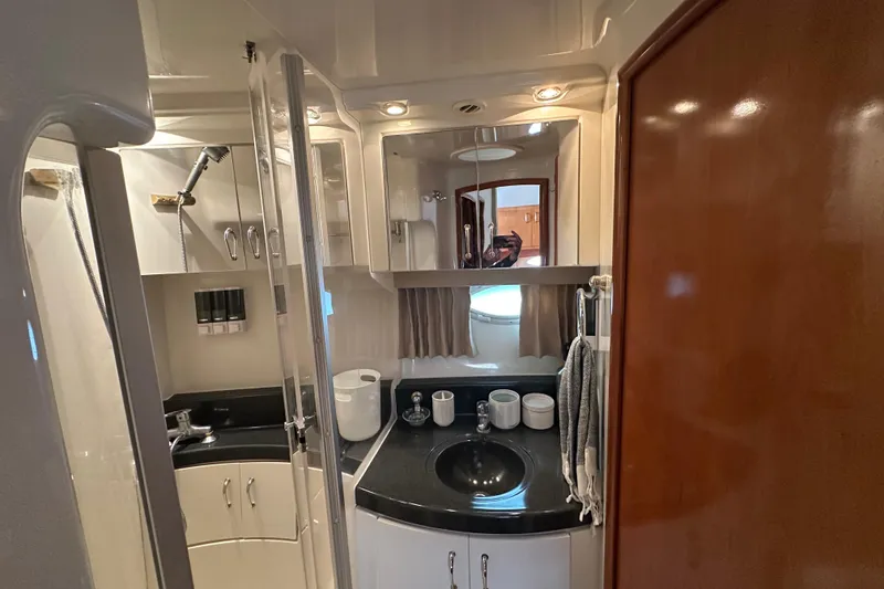 Slide: The Image of Luxurious bathroom interior of 2005 Carver 36 Super Sport yacht with modern fixtures. - 42