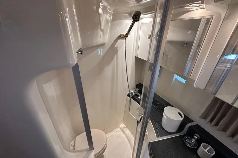 Slide: The Image of 2005 Carver 36 Super Sport yacht bathroom with shower, sink, and modern fixtures. - 44