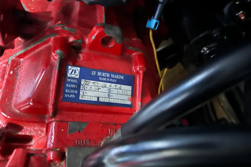 Slide: The Image of Red ZF Hurth Marine engine component in a 2005 Carver 36 Super Sport boat. - 59