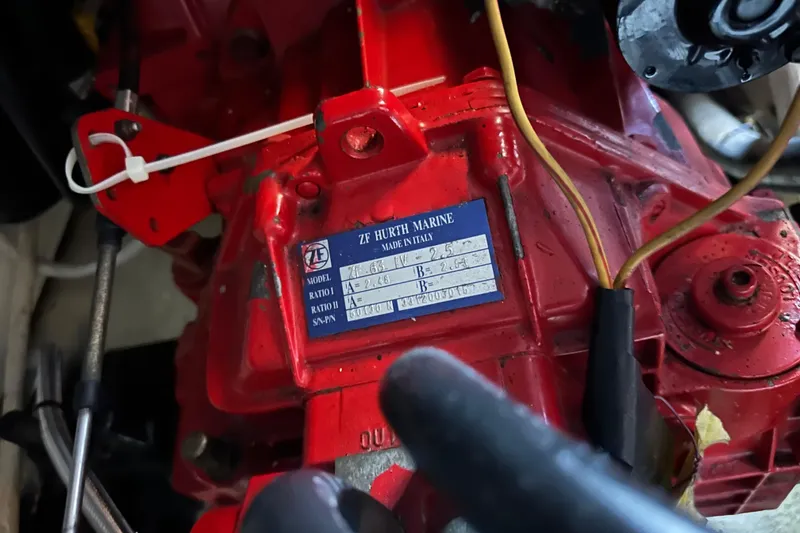 Slide: The Image of Red ZF Hurth Marine engine component in a 2005 Carver 36 Super Sport boat. - 60
