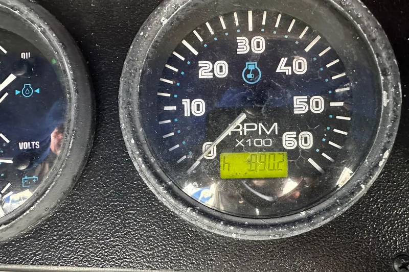 Slide: The Image of Close-up of 2005 Carver 36 Super Sport RPM gauge displaying 4902 hours. - 68