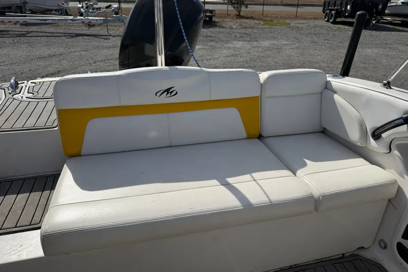 Slide: The Image of 2014 Monterey 197 Blackfin boat with white and yellow seating. - 10