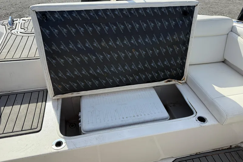 Slide: The Image of 2014 Monterey 197 Blackfin boat seat storage compartment with cooler. - 18