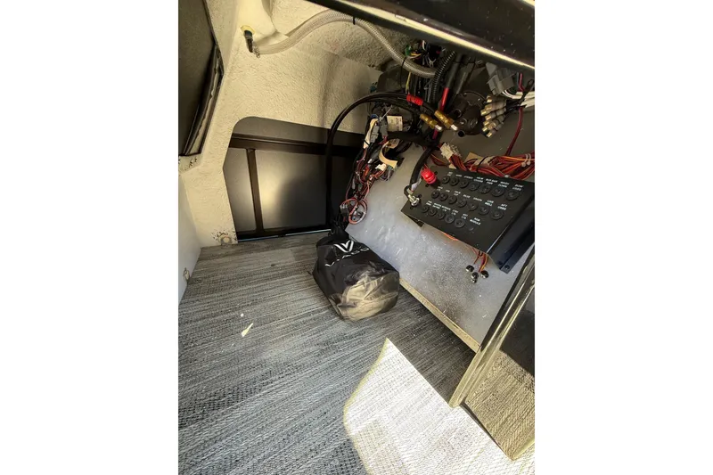 Slide: The Image of Interior view of 2026 Viaggio X22Q showcasing wiring and control panel. - 16