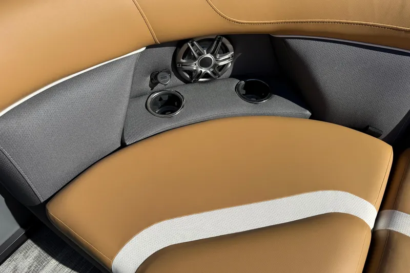 Slide: The Image of Luxurious Viaggio X22Q 2026 boat seating with cup holders and speaker system. - 22