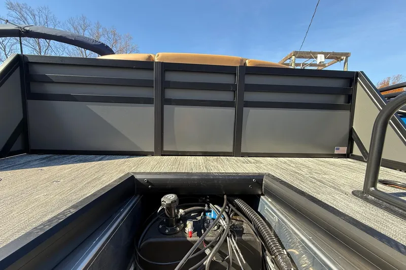 Slide: The Image of 2026 Viaggio X22Q pontoon boat deck with storage compartment and railing. - 29