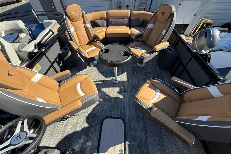 Slide: The Image of Luxurious 2026 Viaggio X22Q boat interior with tan seating and central table. - 3