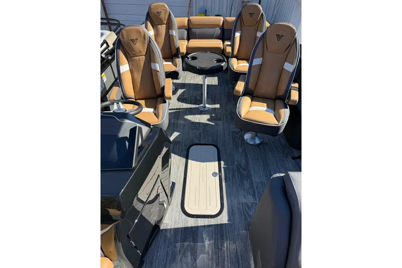 Slide: The Image of Luxurious interior of 2026 Viaggio X22Q boat with tan seating and modern design. - 5