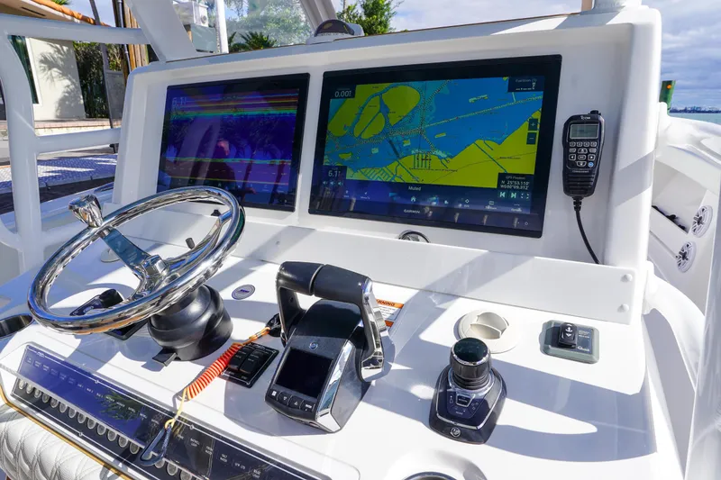 Slide: The Image of Triple Mercury Verado outboard engines on 2024 Invincible 43 Open Fisherman boat. - 16