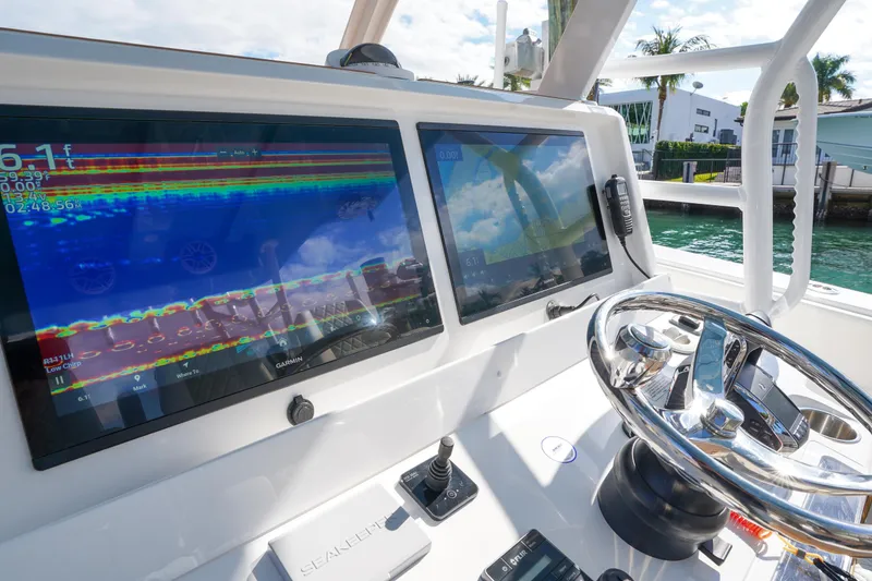 Slide: The Image of Triple Mercury outboard engines on 2024 Invincible 43 Open Fisherman boat. - 17