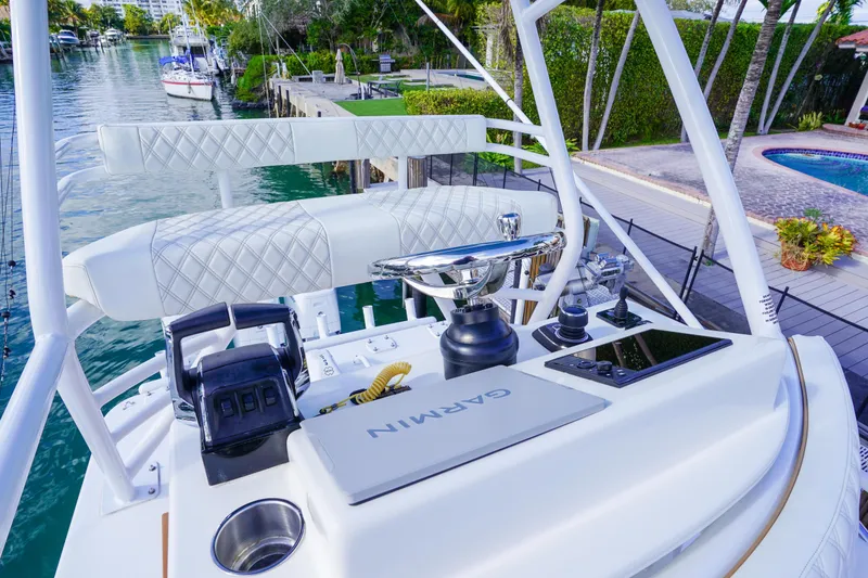 Slide: The Image of 2024 Invincible 43 Open Fisherman boat with luxurious seating and sleek design. - 35