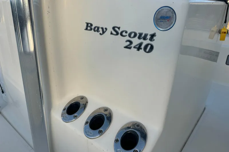 Slide: The Image of 2006 Scout 240 Bay Scout boat detail with chrome fittings and logo. - 5