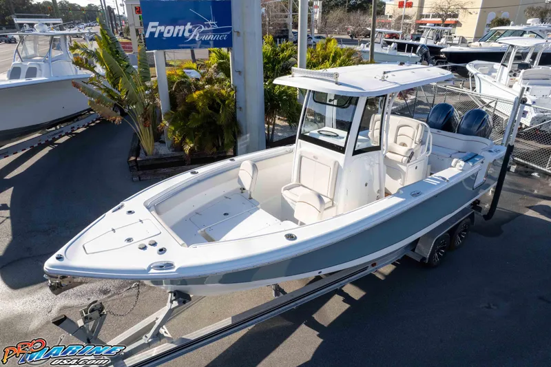 Slide: The Image of 2021 Sea Hunt Ultra 265 SE boat on trailer at dealership. - 32