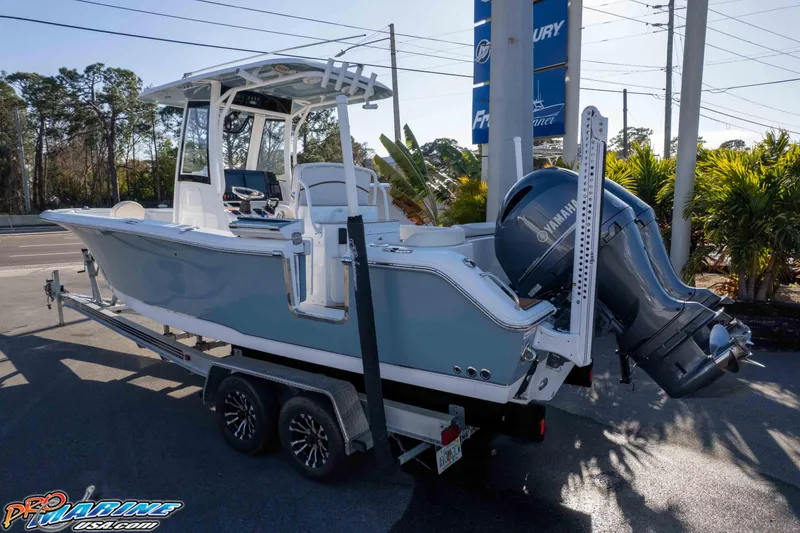 Slide: The Image of 2021 Sea Hunt Ultra 265 SE boat on trailer with Yamaha outboard engine. - 37
