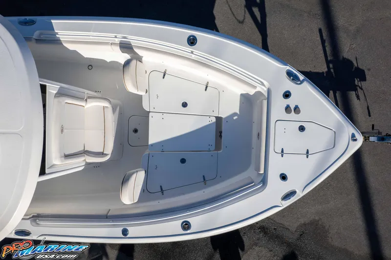 Slide: The Image of 2021 Sea Hunt Ultra 265 SE boat, aerial view of bow seating and storage compartments. - 46