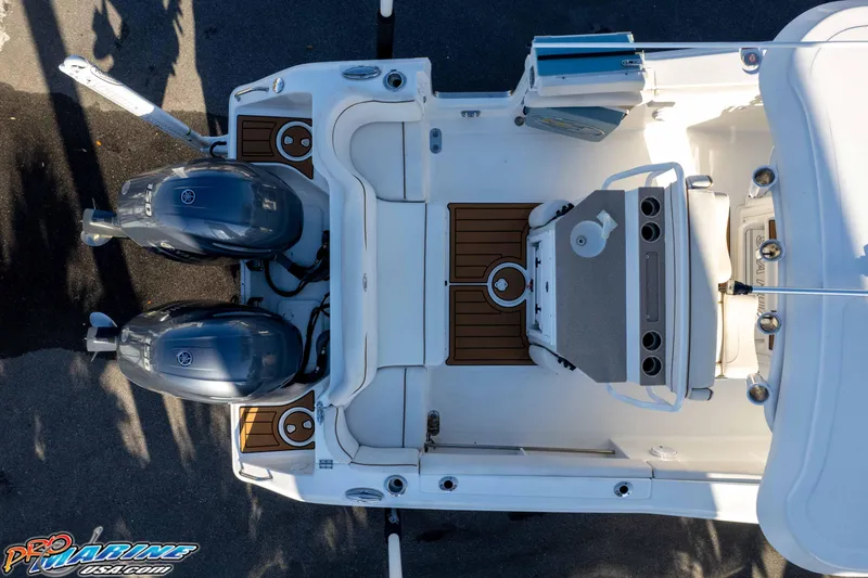 Slide: The Image of Top view of 2021 Sea Hunt Ultra 265 SE boat with dual engines and deck details. - 48