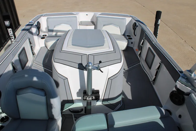 Slide: The Image of 2022 MasterCraft ProStar boat interior with sleek seating and modern design. - 15