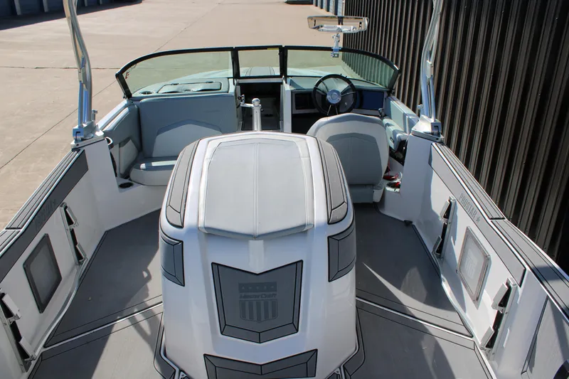 Slide: The Image of 2022 MasterCraft ProStar boat interior with sleek design and modern features. - 7