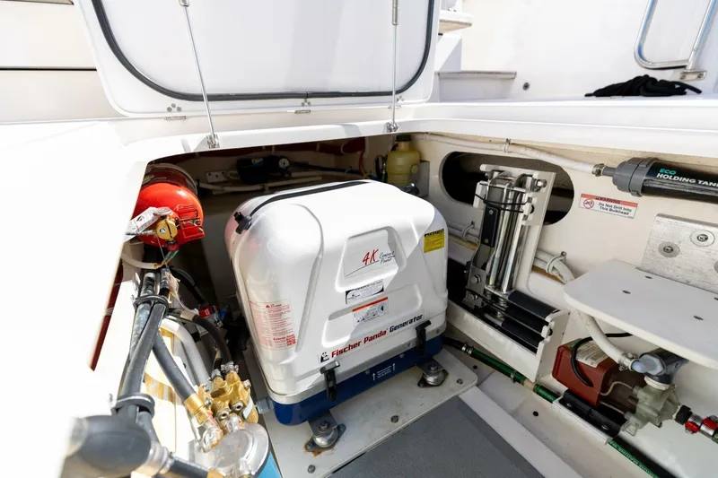 Slide: The Image of Engine compartment of a 2019 Pursuit S 368 Sport boat with Fischer Panda generator. - 30