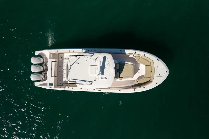 Slide: The Image of Overhead view of 2019 Pursuit S 368 Sport boat on water. - 39