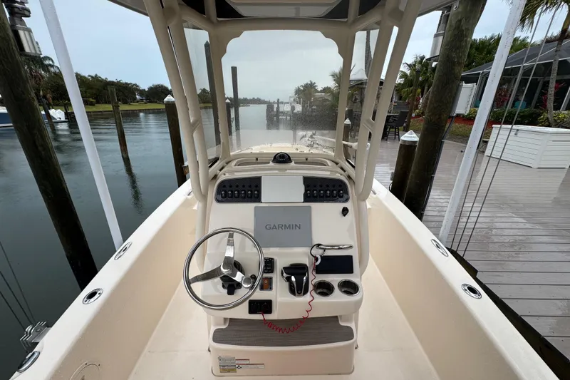 Slide: The Image of 2022 Grady-White 251 Coastal Explorer boat helm with Garmin navigation system. - 23