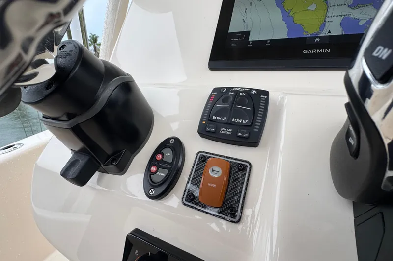 Slide: The Image of Control panel of 2022 Grady-White 251 Coastal Explorer with Garmin navigation display. - 32