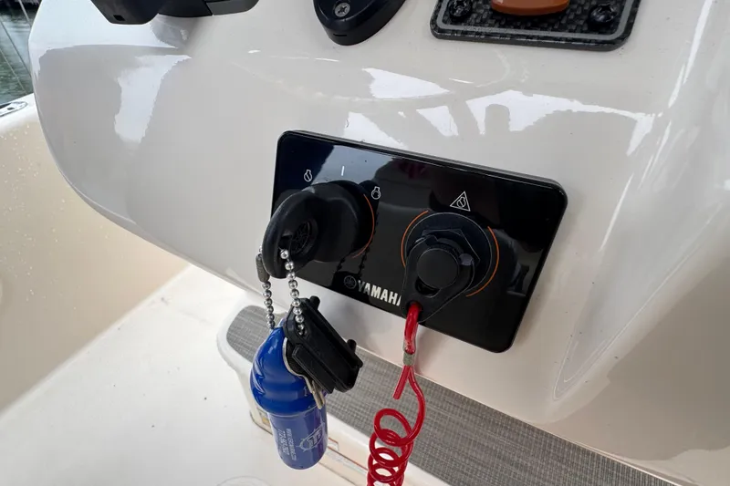 Slide: The Image of Control panel of 2022 Grady-White 251 Coastal Explorer with Yamaha ignition keys. - 34
