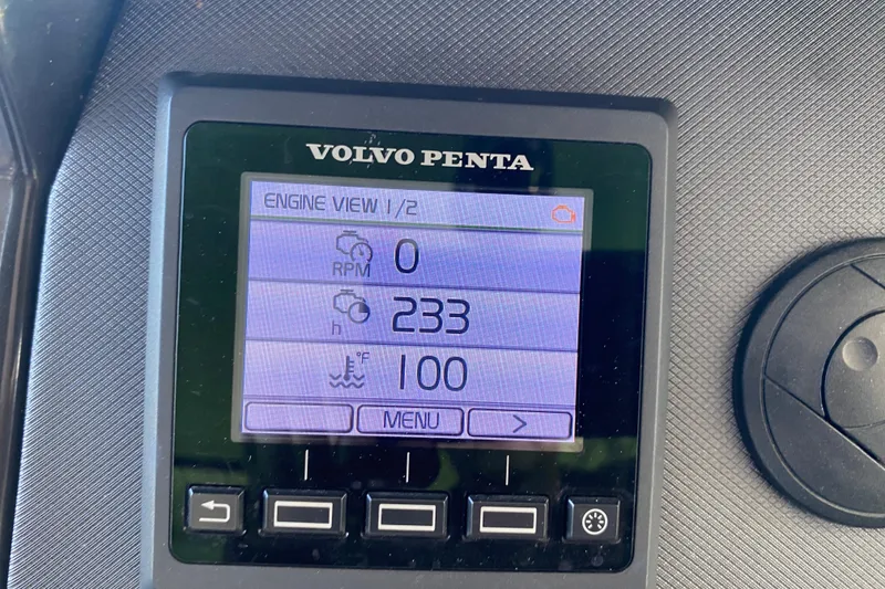 Slide: The Image of Volvo Penta engine display on 2017 Monterey 355 Sport Yacht showing RPM, hours, and temperature. - 19