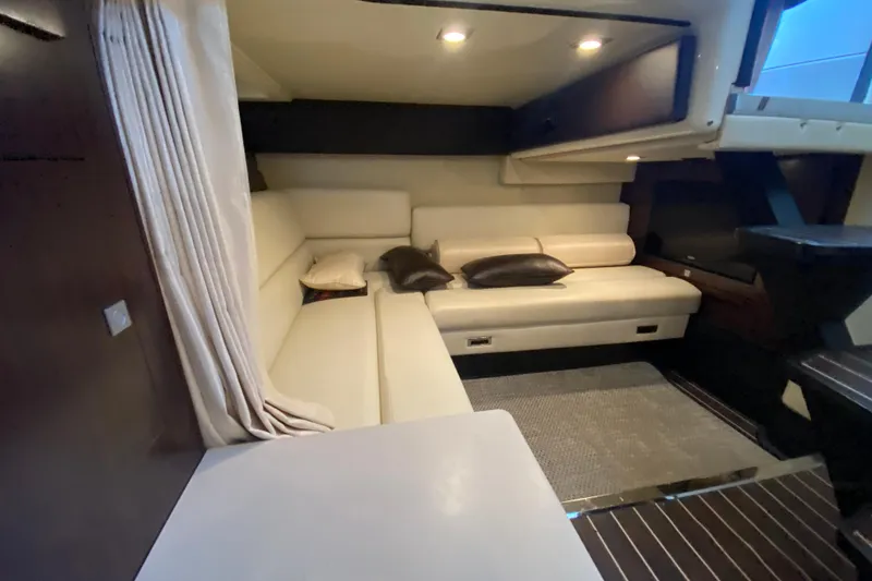 Slide: The Image of Interior of 2017 Monterey 355 Sport Yacht with white leather seating and modern design. - 34