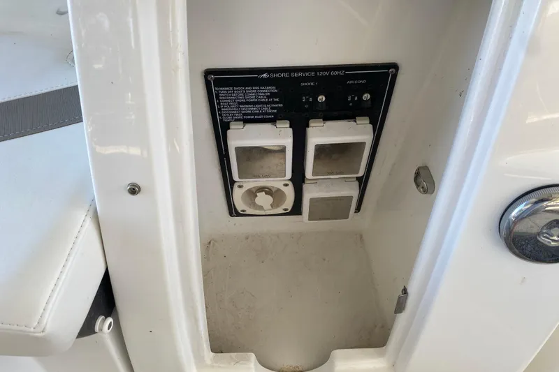 Slide: The Image of Shore power connections on a 2017 Monterey 355 Sport Yacht, featuring 120V 60Hz service. - 66